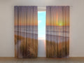 Foto Tende Dune e Spiaggia al Tramonto nei Paesi Bassi
