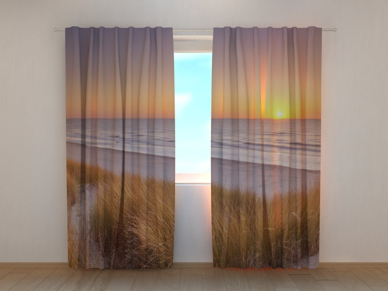 Foto Tende Dune e Spiaggia al Tramonto nei Paesi Bassi